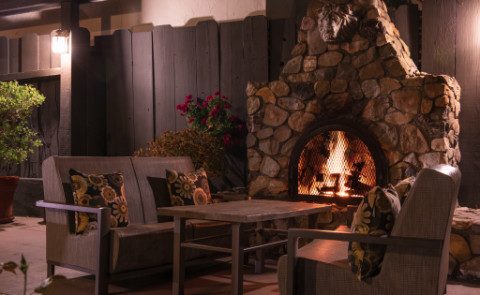 Patio with fireplace